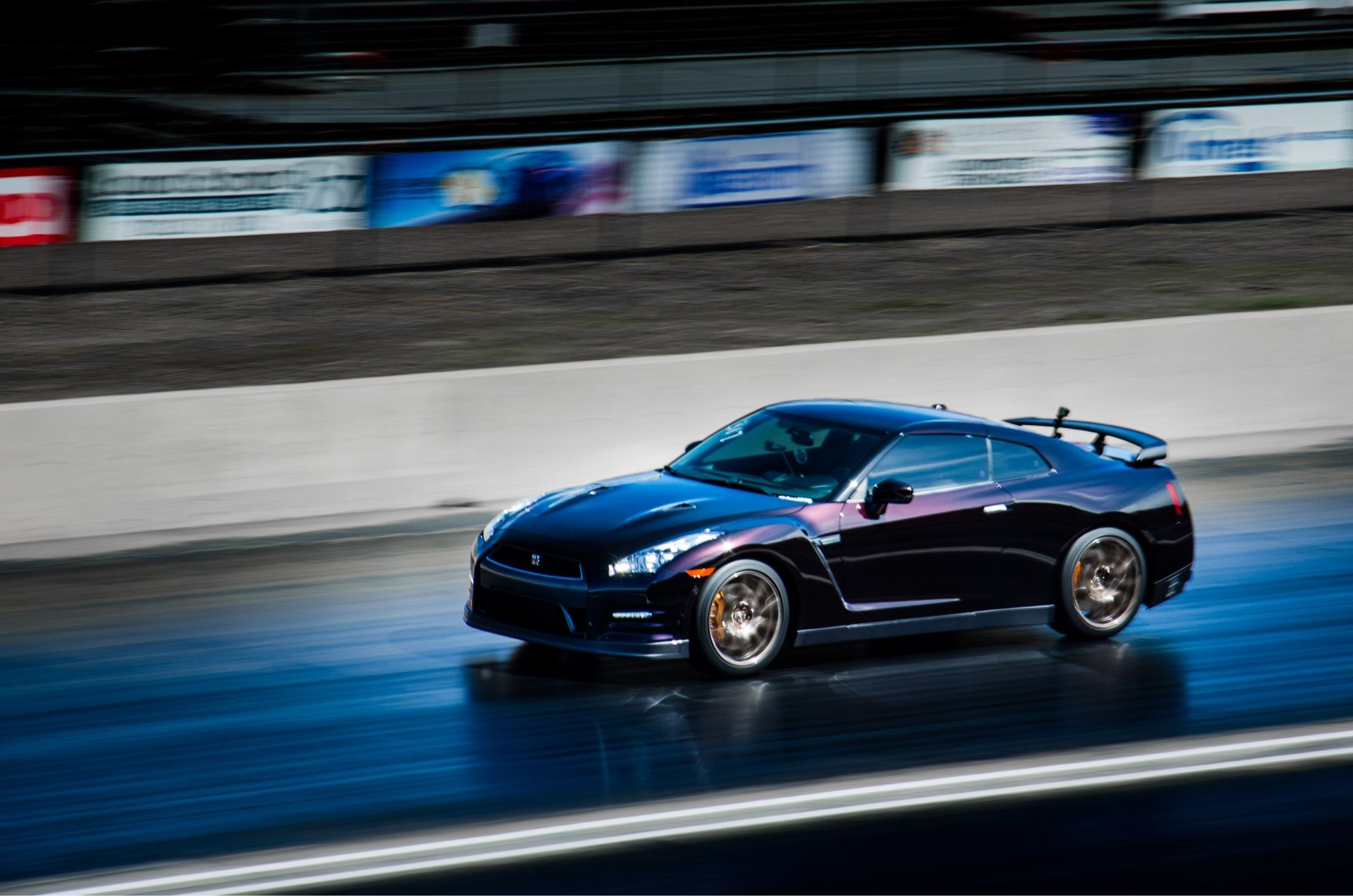 Brian's former black Nissan GT-R launching down the drag strip at Bandimere Speedway